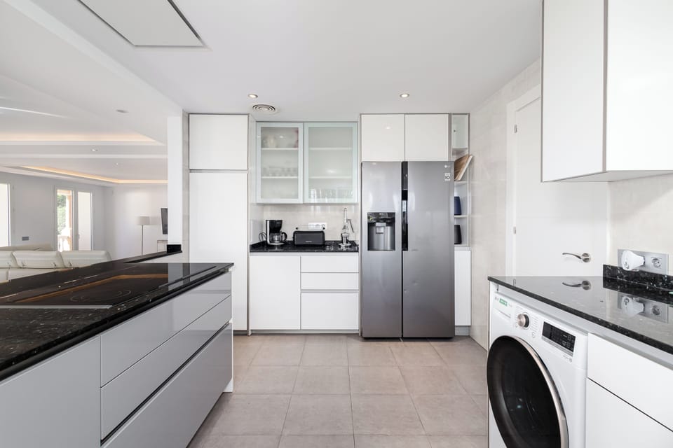 Bright and airy kitchen layout - ideal for preparing large family meals.