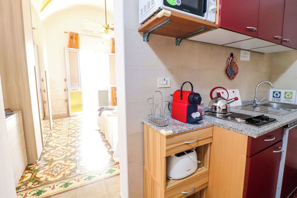 Wood, Flooring, Major Appliance, Floor, Interior Design, Kitchen Appliance, Furniture, Room, Kitchen, Countertop