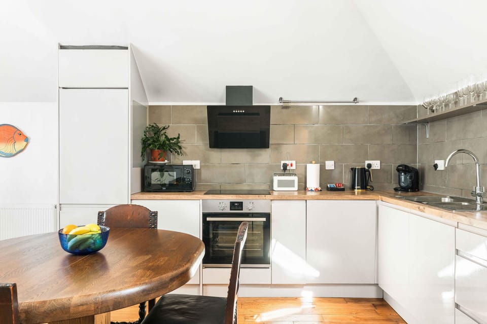 Open-plan kitchen and lounge with dining space, perfect for social evenings and relaxed mornings