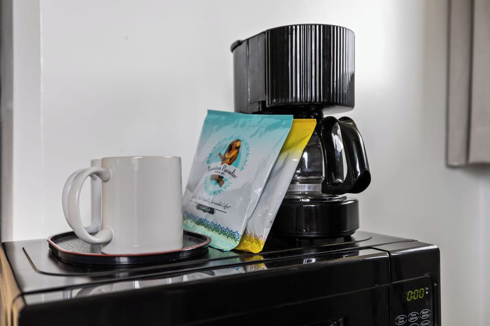 Start your mornings right with fresh coffee from your in-room coffee maker, complete with complimentary local coffee and a cozy mug.