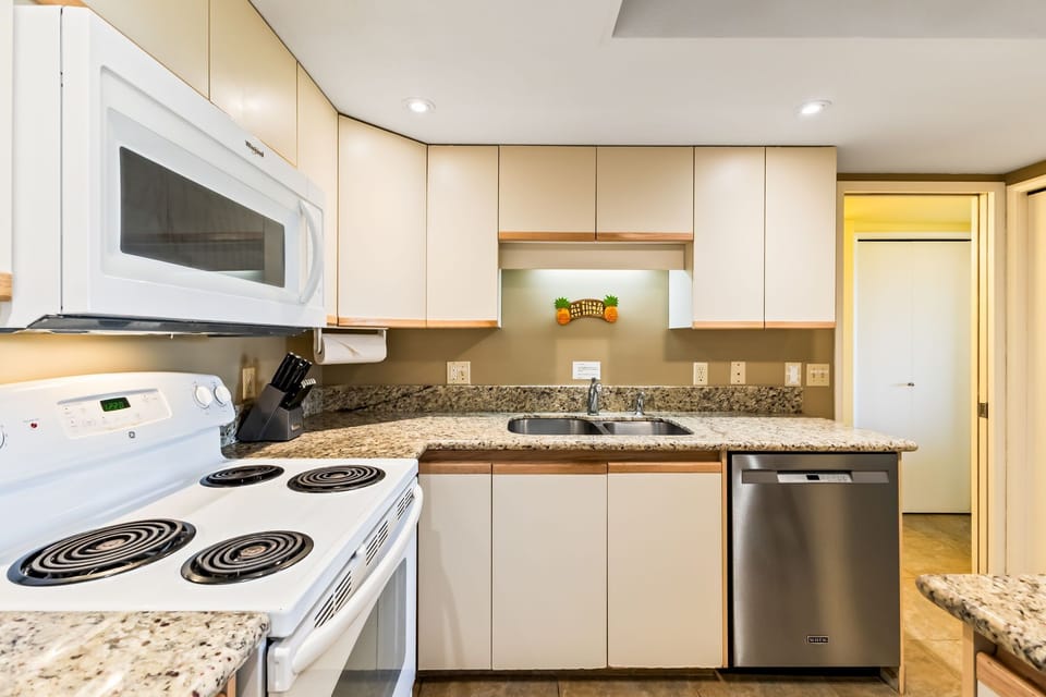Your fully equipped kitchen features granite countertops, modern appliances, and everything you need to prepare delicious meals during your stay.