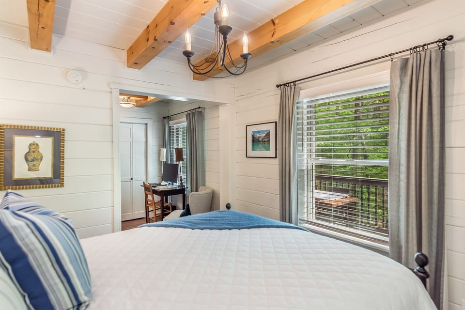 Main floor bedroom with sitting area and workstation!