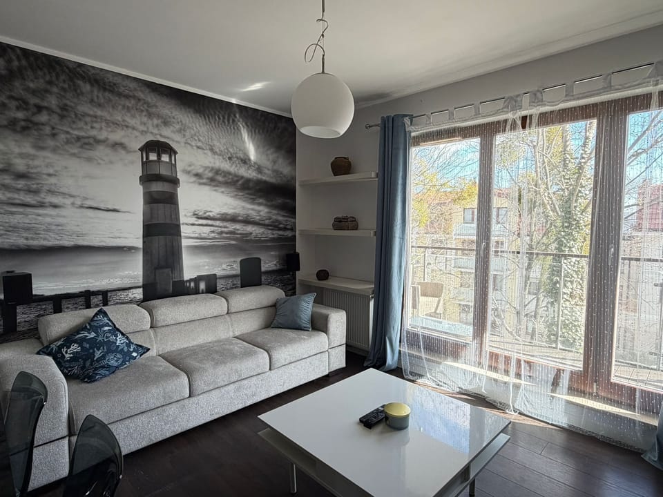 Deluxe Apartment | Living area | Flat-screen TV