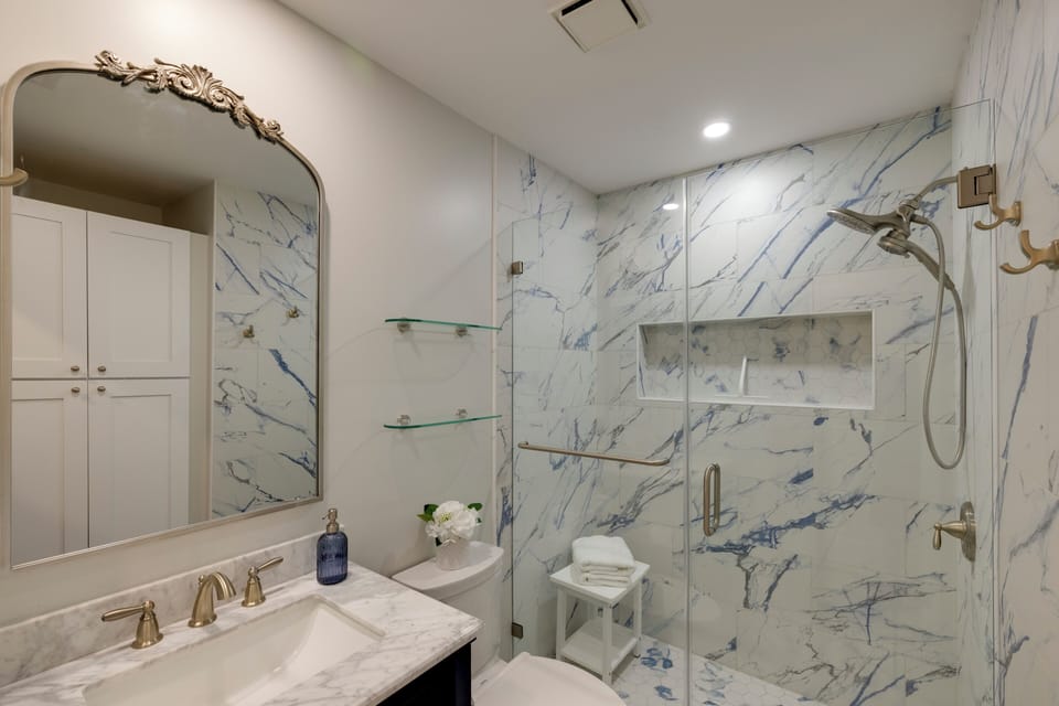 NEW! Designer Bathroom features Marble, Custom Tile, Walk-in Spa Shower!