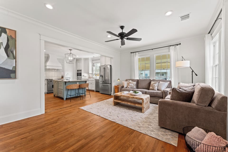 The open-concept layout seamlessly connects the living room and kitchen, creating a spacious and welcoming place to gather.