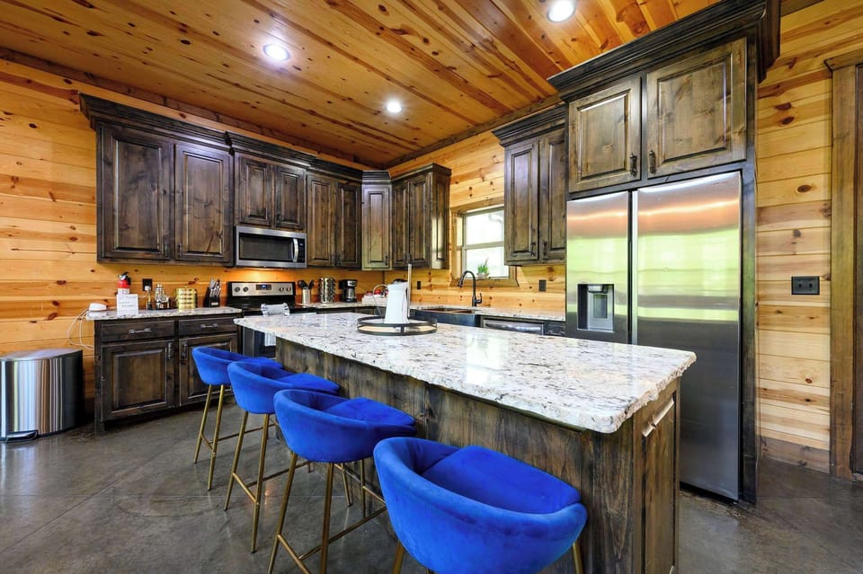 The open kitchen offers ample space & all the comforts of home​