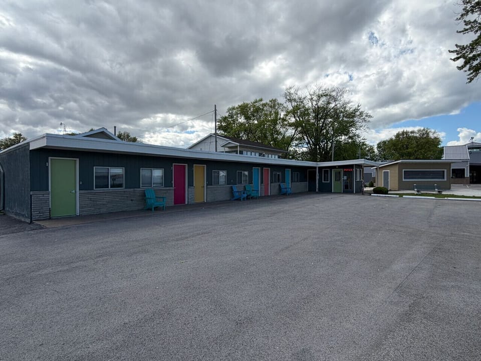 The Cedar — exterior of the converted 1950s motor court on Sandusky Bay