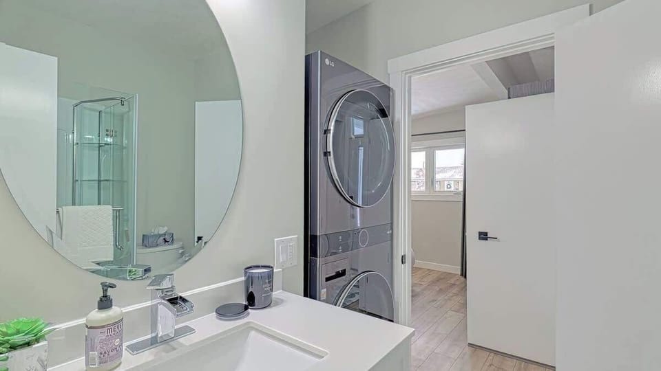 Ensuite Bathroom and washer and dryer.