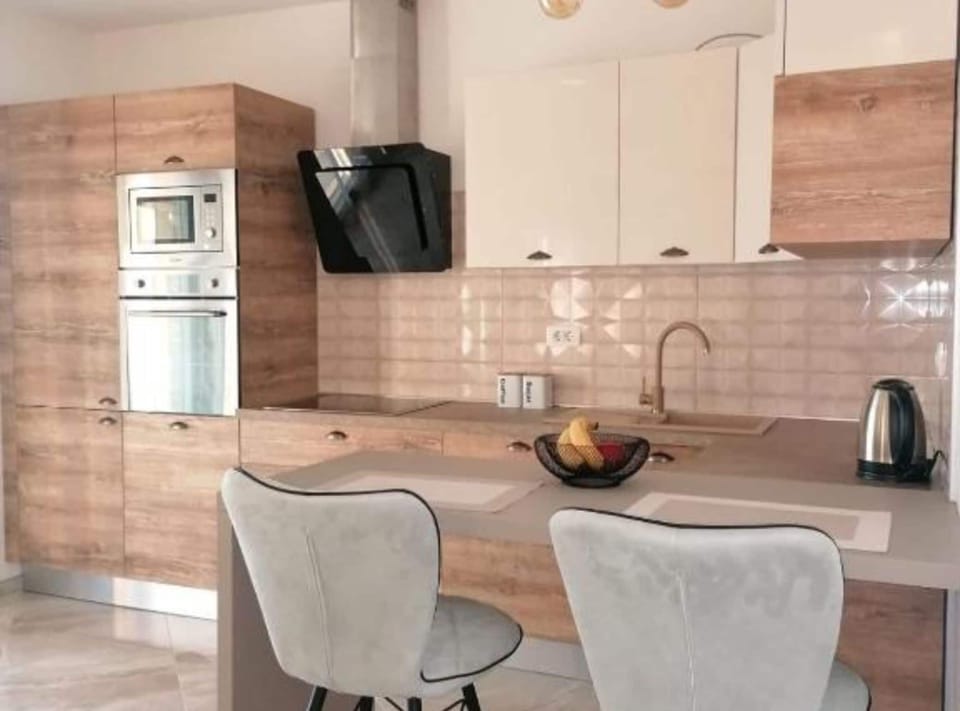 Apartment (Two Bedroom Apartment with rooftop sw) | Private kitchen | Fridge