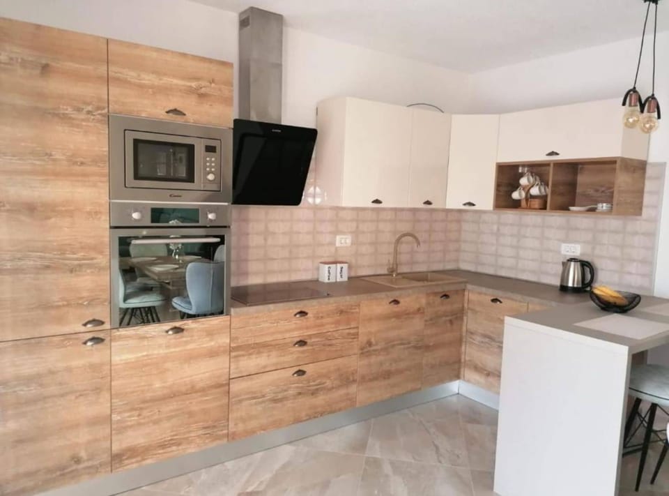 Apartment (Two Bedroom Apartment with rooftop sw) | Private kitchen | Fridge