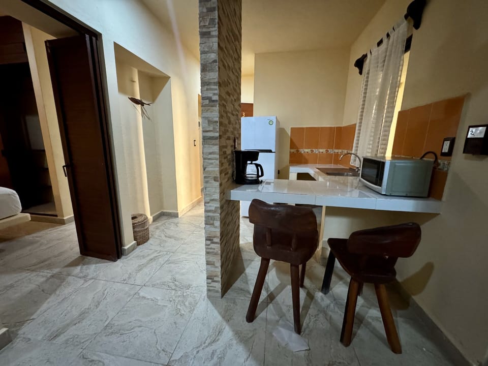 Deluxe Studio | Private kitchen | Coffee/tea maker, full-size fridge, microwave, blender