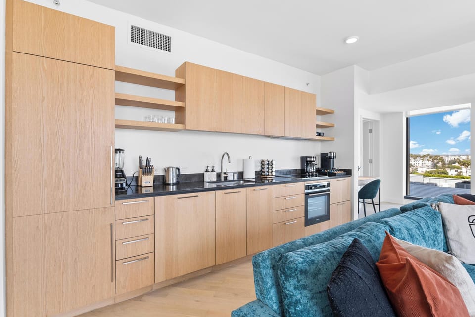 Sophisticated culinary space with designer cabinetry and sleek finishes.