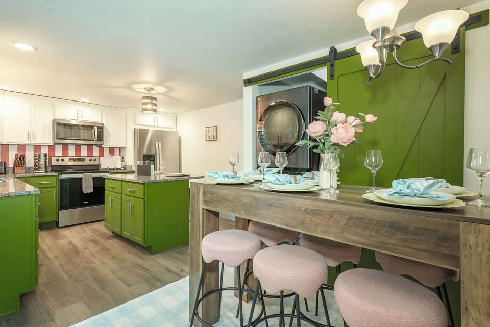 Enjoy the convenience of top-tier appliances and an in-unit laundry center, all wrapped in a playful, open-concept design that makes every meal feel like a celebration.