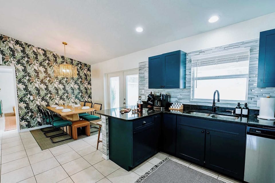 Morning coffee, home-cooked meals, and good conversations — this spacious kitchen and dining space has everything you need to feel right at home.  Featuring ample storage and plenty of room to move around.