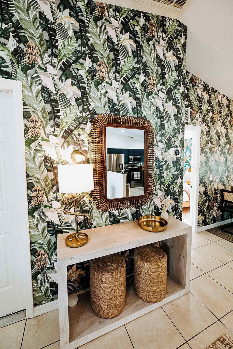 A beautiful welcome awaits at every turn - complete with a rattan mirror, woven baskets, and curated decor — adds warmth and personality right from the moment you arrive. 