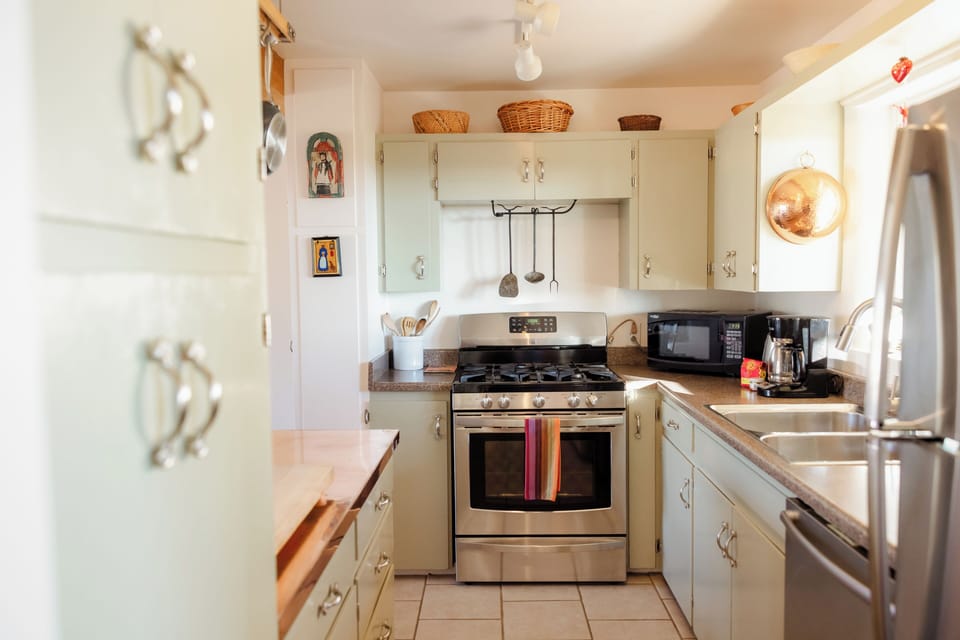 A cooks kitchen with all you need for a meal at home.