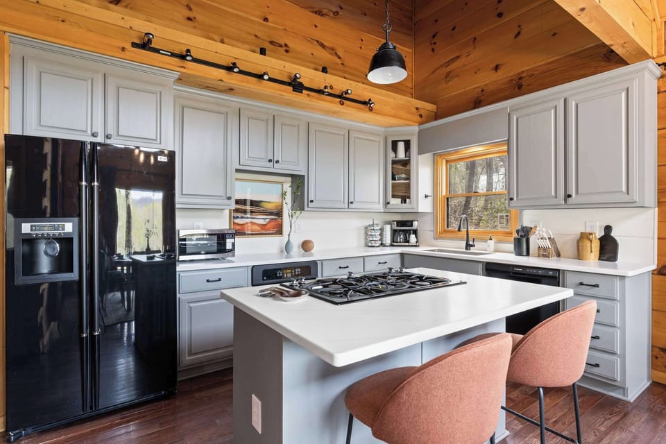 Chef’s Dream Kitchen – Fully stocked with high-end appliances and plenty of cabinetry, making cooking a breeze.