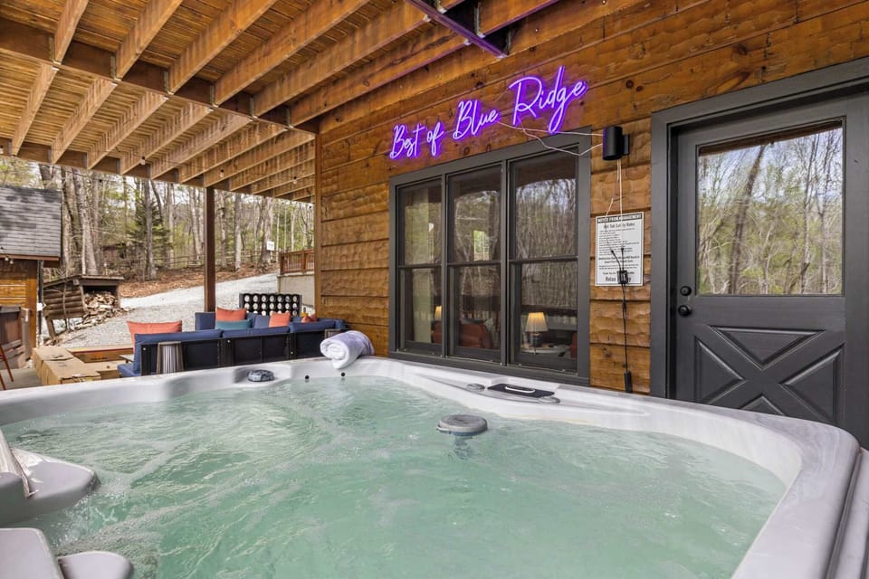 Your private spa retreat awaits! Wood-fired aesthetics, cool neon lights, and warm bubbling water. This is exactly where you’ll want to be every single night of your stay.