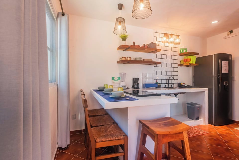 Studio #2 with partial ocean view | Private kitchen | Mini-fridge, microwave, stovetop, toaster oven