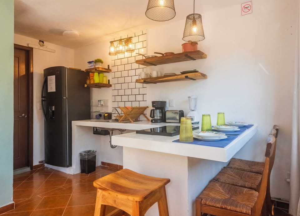 Study #1 with patio view | Private kitchen | Mini-fridge, microwave, stovetop, toaster oven