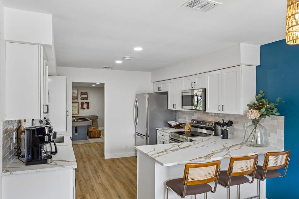 Spacious & Modern – Enjoy a well-equipped kitchen with premium appliances and ample cabinetry for all your cooking needs.