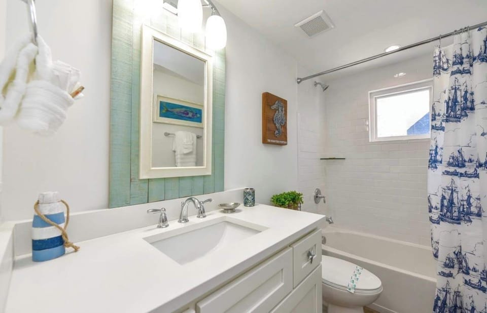 Bathroom vanity and tub-shower combination