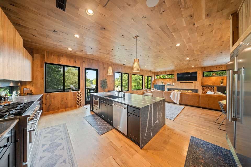 Large, chef's grade appliances in the fully stocked kitchen.