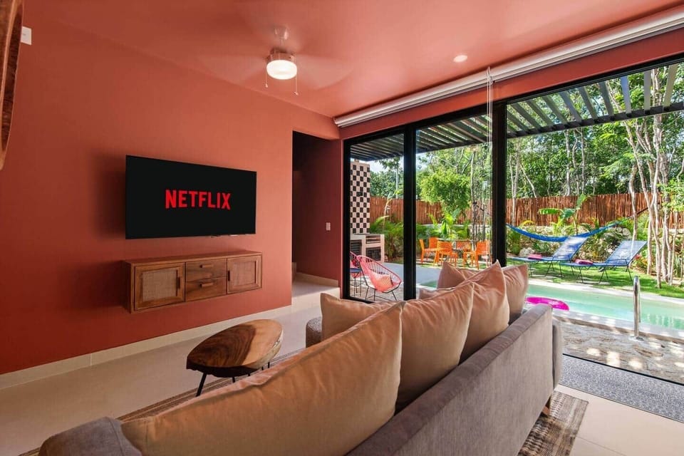 Enjoy the comfy couch while taking in views of the pool and streaming your favorite shows or movies. Includes A/C, a ceiling fan, and room-darkening shades for added comfort.