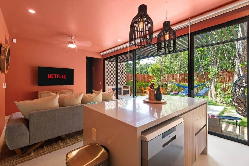 Kitchen island seating for 3—perfect for meals or morning coffee, with a beautiful backyard pool view just behind you.
