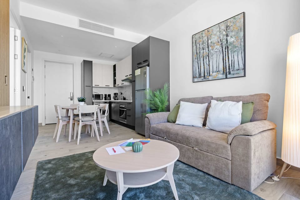 Apartment, 1 King Bed with Sofa bed, Pool Access (The Towers F210) | Living area