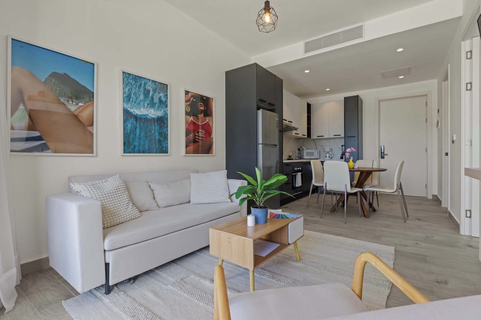 Apartment, 1 Queen Bed with Sofa bed, Patio, Pool View (The Towers F208) | Living area
