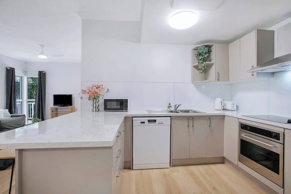 Cook with ease in the streamlined kitchen, set up for simple meals or slow evenings at home.