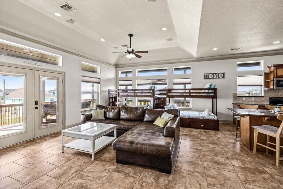 Open living & dining layout with natural light – ideal Bolivar Peninsula vacation home