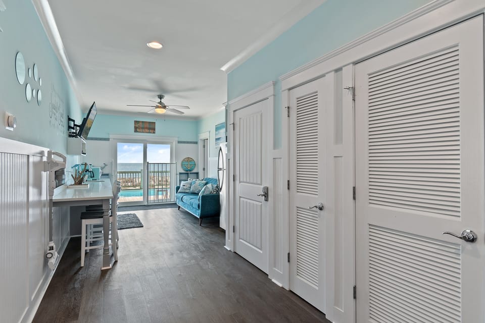 The entry-level lounge features a cozy seating area, Smart TV, and kitchenette