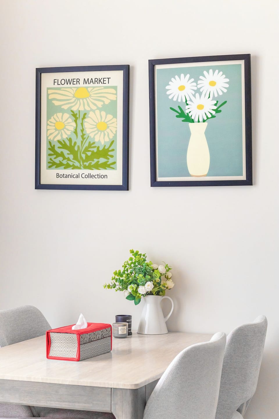 Stylish dining area with comfortable seating and curated artwork