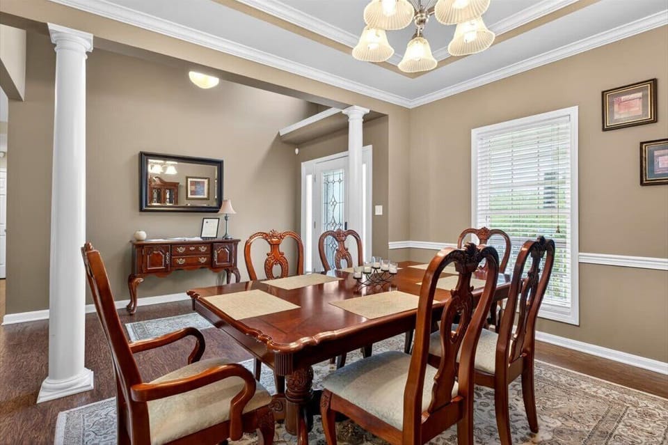 Dining Area: Gather and enjoy meals in this inviting dining area, designed for comfort and connection with a warm and welcoming atmosphere.