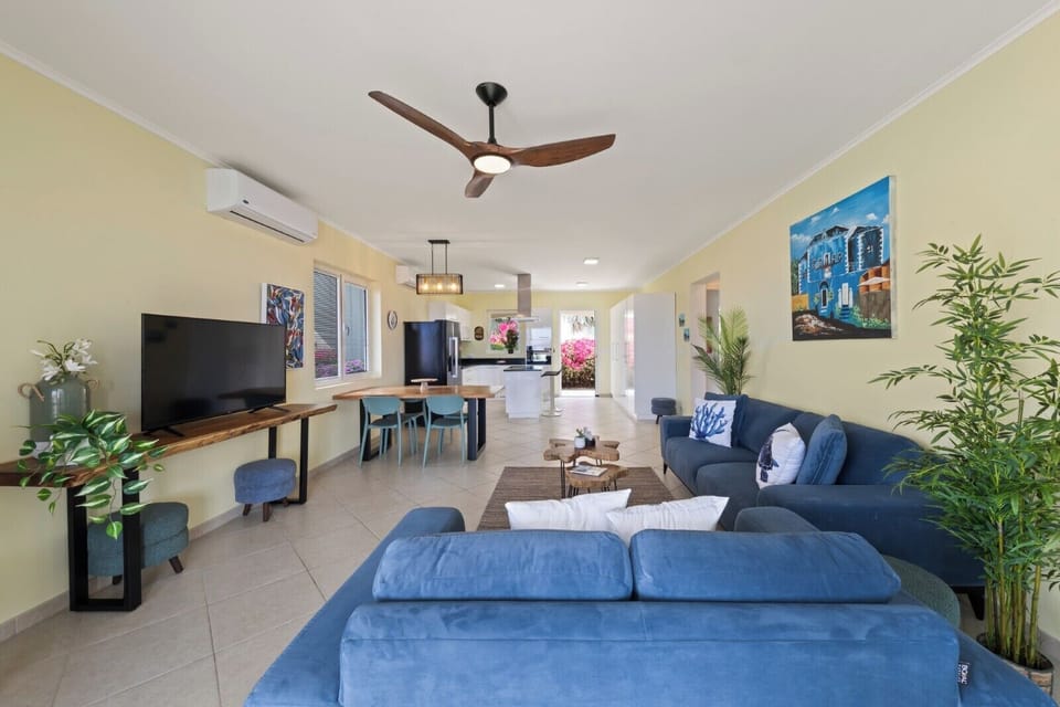 Open-plan layout connecting living, dining and kitchen areas for easy entertaining