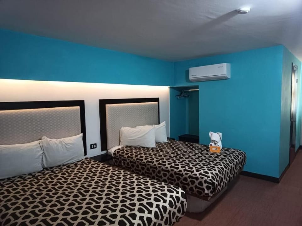 Enjoy a cool, air-conditioned room with welcoming finishing touches.