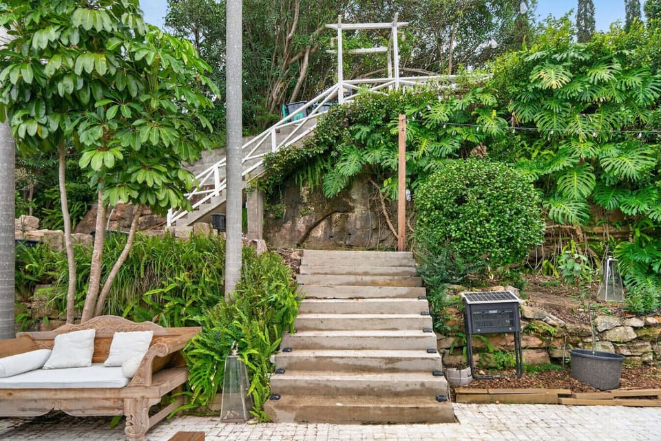 Access to the house via stairs from the street level.