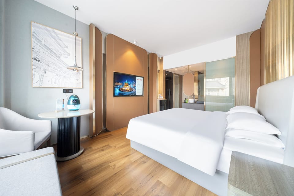 Luxury Double Room, City View | Minibar (some free items), desk, blackout drapes