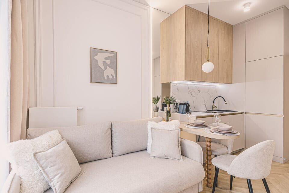 Details that make the difference — a comfortable sofa, stylish dining setup and beautifully finished interior.