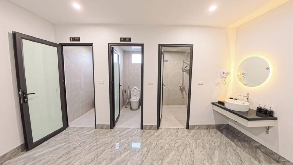 Shared Dormitory, City View | Bathroom | Shower, hair dryer, slippers, towels