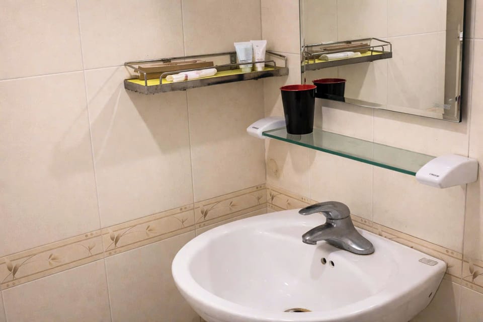 Basic Double Room | Bathroom | Shower, free toiletries, hair dryer, slippers