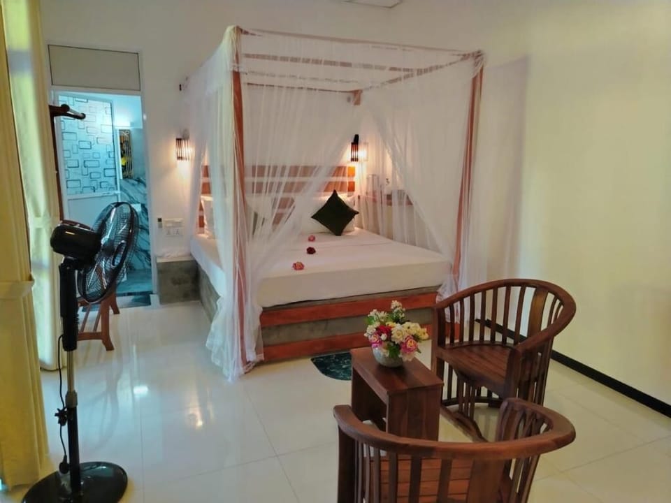 Deluxe Double Room, Balcony, Garden View | Desk, iron/ironing board, free WiFi