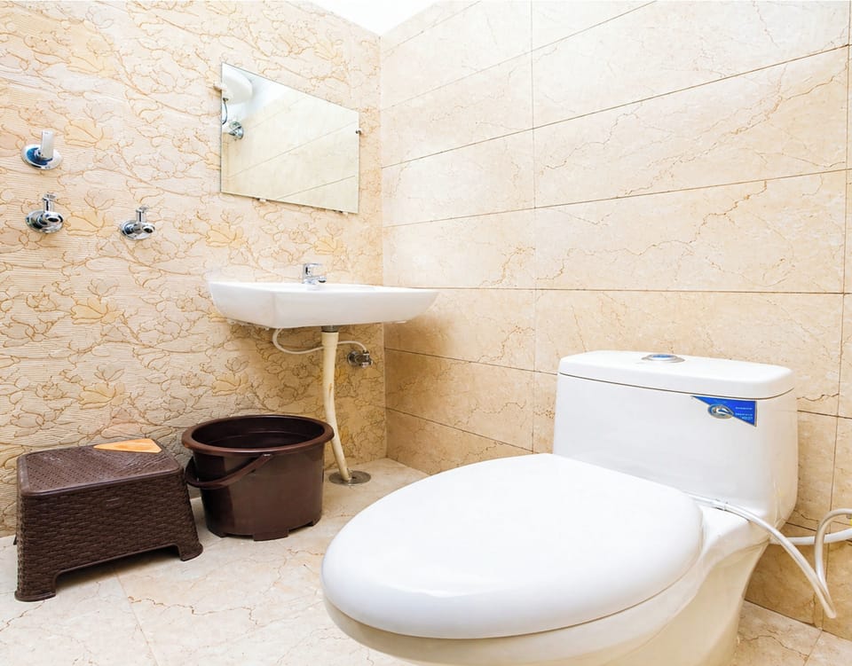Shower, rainfall showerhead, slippers, towels