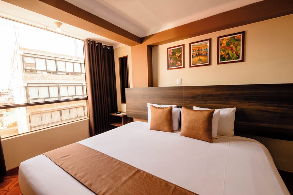 Junior Suite | 10 bedrooms, down comforters, individually decorated, desk