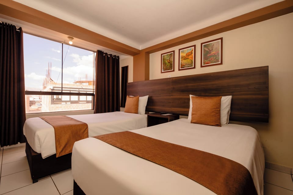 Standard Double or Twin Room | 10 bedrooms, down comforters, individually decorated, desk
