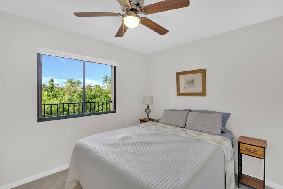 Guest bedroom with tropical views