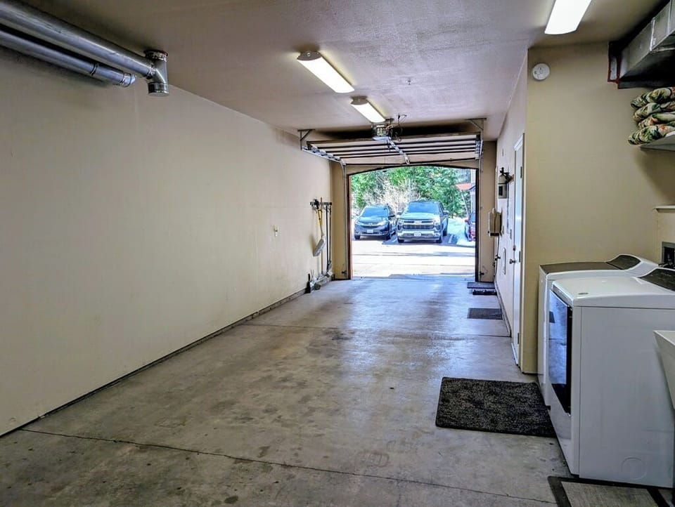 Attached heated 2 car tandem garage