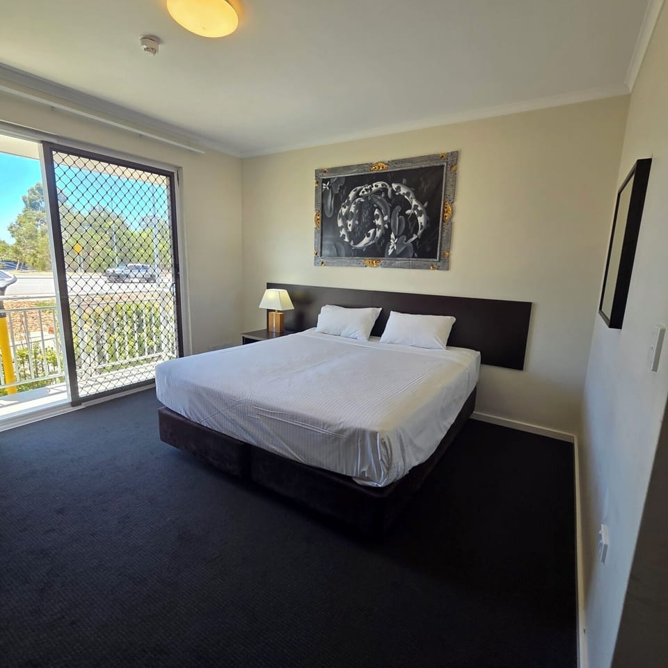 King Room | Laptop workspace, blackout drapes, iron/ironing board, free WiFi